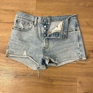 Levi’s | 501 denim distressed light blue jean shorts Women’s size 31 stretch